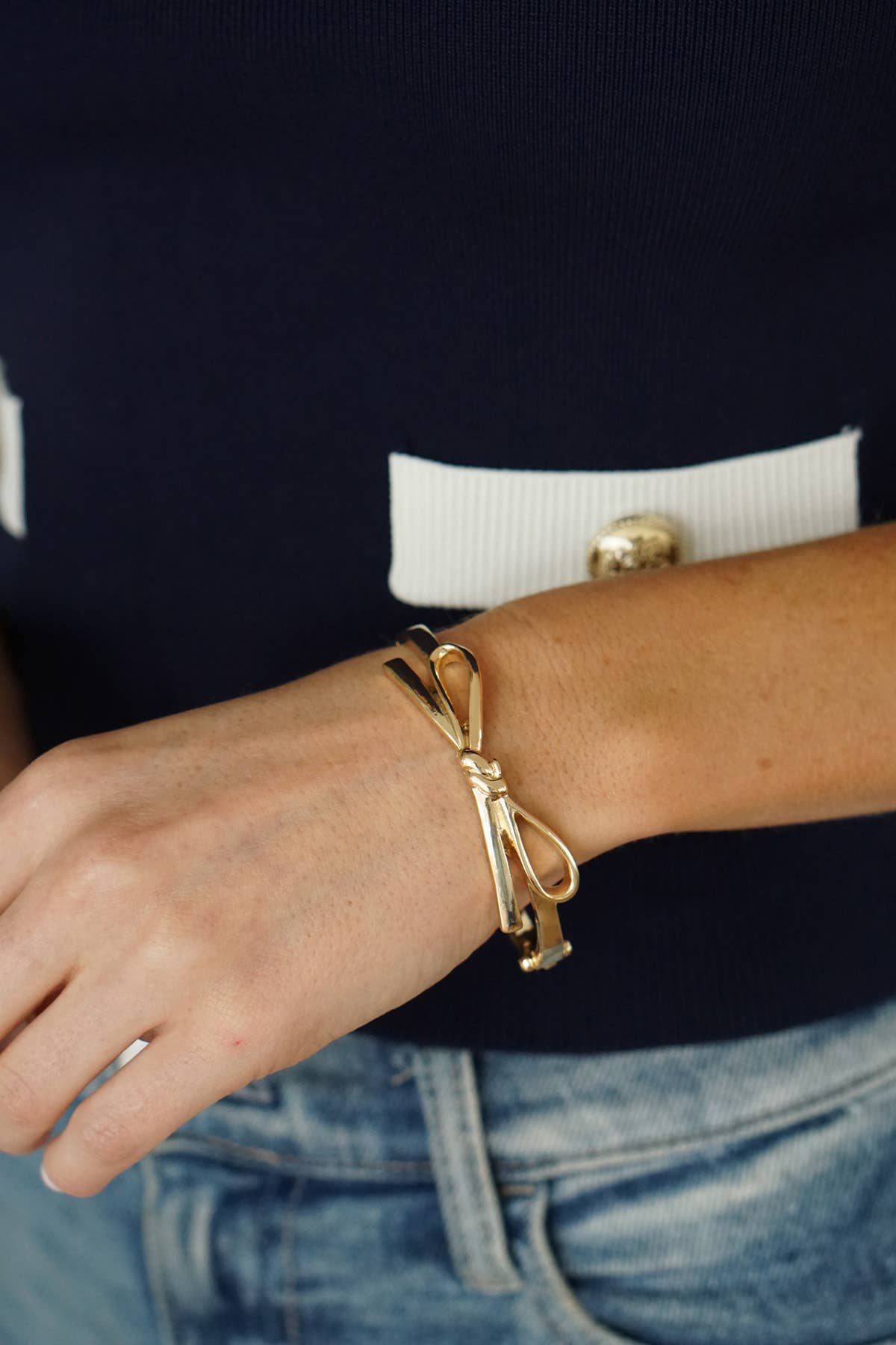 Karina Bow Wrapped Hinge Bangle in Gold